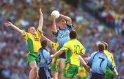 17 August 2002; Ciarán Whelan of Dublin catches the ball ahead of John Gildea of Donegal during the Bank of Ireland All-Ireland Senior Football Championship Quarter-Final Replay match between Dublin and Donegal at Croke Park in Dublin. Photo by Ray McManus/Sportsfile
