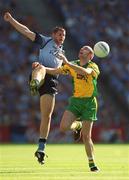17 August 2002; Paul McGonigle of Donegal in action against Darren Magee of Dublin during the Bank of Ireland All-Ireland Senior Football Championship Quarter-Final Replay match between Dublin and Donegal at Croke Park in Dublin. Photo by Ray McManus/Sportsfile