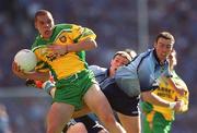 17 August 2002; Kevin Cassidy of Donegal in action against Ray Cosgrove, right, and Colin Moran of Dublin during the Bank of Ireland All-Ireland Senior Football Championship Quarter-Final Replay match between Dublin and Donegal at Croke Park in Dublin. Photo by Ray McManus/Sportsfile