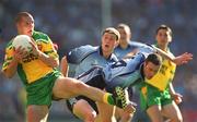 17 August 2002; Kevin Cassidy of Donegal in action against Ray Cosgrove, right, and Colin Moran of Dublin during the Bank of Ireland All-Ireland Senior Football Championship Quarter-Final Replay match between Dublin and Donegal at Croke Park in Dublin. Photo by Ray McManus/Sportsfile