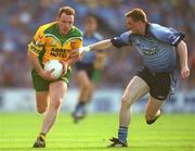 17 August 2002; Adrian Sweeney of Donegal is tackled by Coman Goggins of Dublin during the Bank of Ireland All-Ireland Senior Football Championship Quarter-Final Replay match between Dublin and Donegal at Croke Park in Dublin. Photo by Ray McManus/Sportsfile