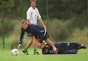 19 August 2002; Jason McAteer watches on as Damien Duff is tackled by Dean Kiely during a Republic of Ireland training session at the AUL Complex in Clonshaugh, Dublin. Photo by Aoife Rice/Sportsfile