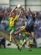 17 August 2002; Raymond Sweeney of Donegal in action against John McNally of Dublin during the Bank of Ireland All-Ireland Senior Football Championship Quarter-Final Replay match between Dublin and Donegal at Croke Park in Dublin. Photo by Damien Eagers/Sportsfile