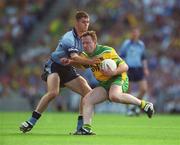 17 August 2002; Adrian Sweeney of Donegal in action against Darren Magee of Dublin during the Bank of Ireland All-Ireland Senior Football Championship Quarter-Final Replay match between Dublin and Donegal at Croke Park in Dublin. Photo by Ray McManus/Sportsfile