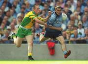 17 August 2002; Alan Brogan of Dublin in action against Noel McGinley of Donegal during the Bank of Ireland All-Ireland Senior Football Championship Quarter-Final Replay match between Dublin and Donegal at Croke Park in Dublin. Photo by Ray McManus/Sportsfile