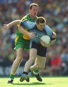 17 August 2002; Dessie Farrell of Dublin is tackled by Raymond Sweeney of Donegal during the Bank of Ireland All-Ireland Senior Football Championship Quarter-Final Replay match between Dublin and Donegal at Croke Park in Dublin. Photo by Ray McManus/Sportsfile