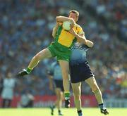 17 August 2002; Raymond Sweeney of Donegal in action against Dessie Farrell of during the Bank of Ireland All-Ireland Senior Football Championship Quarter-Final Replay match between Dublin and Donegal at Croke Park in Dublin. Photo by Ray McManus/Sportsfile
