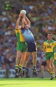 17 August 2002; Ciarán Whelan of Dublin in action against John Gildea of Donegal during the Bank of Ireland All-Ireland Senior Football Championship Quarter-Final Replay match between Dublin and Donegal at Croke Park in Dublin. Photo by Ray McManus/Sportsfile