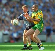 17 August 2002; Shane Ryan of Dublin in action against Paul McGonigle of Donegal during the Bank of Ireland All-Ireland Senior Football Championship Quarter-Final Replay match between Dublin and Donegal at Croke Park in Dublin. Photo by Damien Eagers/Sportsfile