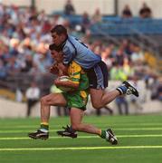 5 August 2002; Michael Hegarty of Donegal in action against Jonathan Magee of Dublin during the Bank of Ireland All-Ireland Senior Football Championship Quarter-Final match between Dublin and Donegal at Croke Park in Dublin. Photo by David Maher/Sportsfile