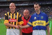 18 August 2002; Referee Aodán Mac Suibhne with team captains Andy Comerford of Kilkenny and Thomas Dunne of Tipperary prior to the Guinness All-Ireland Senior Hurling Championship Semi-Final match between Kilkenny and Tipperary at Croke Park in Dublin. Photo by Pat Murphy/Sportsfile