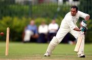 23 August 2002; Naseer Shaukat of Rush plays a ball behind the wicket during the Royal Liver Irish Senior Cricket Cup Final match between Malahide and Rush at Clontarf Cricket Club in Dublin. Photo by David Maher/Sportsfile
