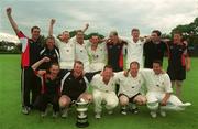 23 August 2002; Malahide captain David McGeehan, front row second from left, and his team-mates celebrate after the Royal Liver Irish Senior Cricket Cup Final match between Malahide and Rush at Clontarf Cricket Club in Dublin. Photo by Ray McManus/Sportsfile