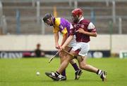 24 August 2002; Willie Doran of Wexford in action against Conor Dervan of Galway during the All-Ireland U21 Hurling Championship Semi-Final match between Galway and Wexford at Semple Stadium in Thurles, Tipperary. Photo by Damien Eagers/Sportsfile