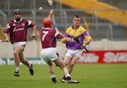 24 August 2002; Darren Stamp of Wexford in action against Michael J Quinn of Galway, 7, during the All-Ireland U21 Hurling Championship Semi-Final match between Galway and Wexford at Semple Stadium in Thurles, Tipperary. Photo by Damien Eagers/Sportsfile