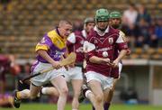 24 August 2002; Adrian Cullinane of Galway in action against Seán O'Neill of Wexford during the All-Ireland U21 Hurling Championship Semi-Final match between Galway and Wexford at Semple Stadium in Thurles, Tipperary. Photo by Damien Eagers/Sportsfile
