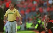 25 August 2002; Kerry manager Páidí Ó Sé walks up the sideline as Cork manager Larry Tompkins looks on during the Bank of Ireland All-Ireland Senior Football Championship Semi-Final match between Kerry and Cork at Croke Park in Dublin. Photo by Damien Eagers/Sportsfile