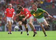 25 August 2002; Graham Canty of Cork in action against John Sheehan of Kerry during the Bank of Ireland All-Ireland Senior Football Championship Semi-Final match between Kerry and Cork at Croke Park in Dublin. Photo by Brian Lawless/Sportsfile