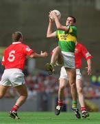 25 August 2002; Eoin Brosnan of Kerry fields the ball ahead of Ronan McCarthy of Cork during the Bank of Ireland All-Ireland Senior Football Championship Semi-Final match between Kerry and Cork at Croke Park in Dublin. Photo by Damien Eagers/Sportsfile