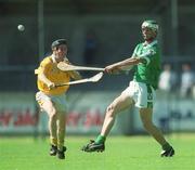 25 August 2002; James O'Brien of Limerick is tackled by Sean Delargy of Antrim during the All-Ireland U21 Hurling Championship Semi-Final match between Antrim and Limerick at Parnell Park in Dublin. Photo by Aoife Rice/Sportsfile