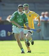 25 August 2002; Pat Tobin of Limerick in action against Ciaran O'Grady of Antrim during the All-Ireland U21 Hurling Championship Semi-Final match between Antrim and Limerick at Parnell Park in Dublin. Photo by Aoife Rice/Sportsfile