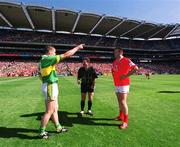 25 August 2002; Kerry captain Darragh Ó Sé indicates to referee Brian White that his team will attack the Canal End in the first half as Cork captain Colin Corkery looks on prior to the Bank of Ireland All-Ireland Senior Football Championship Semi-Final match between Kerry and Cork at Croke Park in Dublin. Photo by Ray McManus/Sportsfile