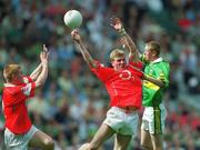 25 August 2002; Anthony Lynch of Cork, supported by team-mate Seán Levis, left, in action against Colm Cooper of Kerry during the Bank of Ireland All-Ireland Senior Football Championship Semi-Final match between Kerry and Cork at Croke Park in Dublin. Photo by Damien Eagers/Sportsfile