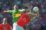 25 August 2002; Michael McCarthy of Kerry in action against Alan Cronin of Cork during the Bank of Ireland All-Ireland Senior Football Championship Semi-Final match between Kerry and Cork at Croke Park in Dublin. Photo by Ray McManus/Sportsfile