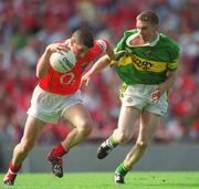 25 August 2002; Fionan Murray of Cork in action against Marc Ó Sé of Kerry during the Bank of Ireland All-Ireland Senior Football Championship Semi-Final match between Kerry and Cork at Croke Park in Dublin. Photo by Ray McManus/Sportsfile