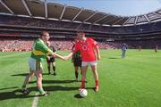 25 August 2002; Kerry captain Darragh Ó Sé shakes hands with Cork captain Colin Corkery before referee Brian White tosses the coin prior to the Bank of Ireland All-Ireland Senior Football Championship Semi-Final match between Kerry and Cork at Croke Park in Dublin. Photo by Ray McManus/Sportsfile