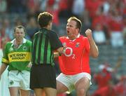 25 August 2002; Cork captain Colin Corkery remonstrates with referee Brian White, after White had disallowed Corkery's quick free goal, during the Bank of Ireland All-Ireland Senior Football Championship Semi-Final match between Kerry and Cork at Croke Park in Dublin. Photo by Damien Eagers/Sportsfile