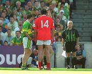 25 August 2002; Colin Corkery of Cork is shown a second yellow card by referee Brian White, before being sent off, as Séamus Moynihan of Kerry looks on during the Bank of Ireland All-Ireland Senior Football Championship Semi-Final match between Kerry and Cork at Croke Park in Dublin. Photo by Damien Eagers/Sportsfile