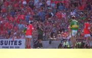 25 August 2002; Colin Corkery of Cork is shown a second yellow card by referee Brian White, before being sent off, during the Bank of Ireland All-Ireland Senior Football Championship Semi-Final match between Kerry and Cork at Croke Park in Dublin. Photo by Ray McManus/Sportsfile