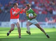 25 August 2002; Dara Ó Cinnéide of Kerry in action against Ciaran O'Sullivan of Cork during the Bank of Ireland All-Ireland Senior Football Championship Semi-Final match between Kerry and Cork at Croke Park in Dublin. Photo by Brian Lawless/Sportsfile