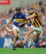 18 August 2002; Thomas Dunne of Tipperary in action against Derek Lyng of Kilkenny during the Guinness All-Ireland Senior Hurling Championship Semi-Final match between Kilkenny and Tipperary at Croke Park in Dublin. Photo by Damien Eagers/Sportsfile