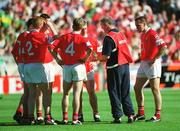 25 August 2002; Cork manager Larry Tompkins speaks to his defence during half-time in the Bank of Ireland All-Ireland Senior Football Championship Semi-Final match between Kerry and Cork at Croke Park in Dublin. Photo by Brian Lawless/Sportsfile