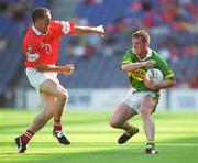 25 August 2002; Dara Ó Cinnéide of Kerry in action against Ciarán O'Sullivan of Cork during the Bank of Ireland All-Ireland Senior Football Championship Semi-Final match between Kerry and Cork at Croke Park in Dublin. Photo by Brian Lawless/Sportsfile