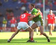 25 August 2002; Darragh Ó Sé of Kerry in action against Graham Canty of Cork during the Bank of Ireland All-Ireland Senior Football Championship Semi-Final match between Kerry and Cork at Croke Park in Dublin. Photo by Brian Lawless/Sportsfile