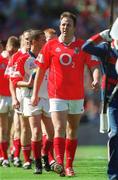 25 August 2002; Cork captain Colin Corkery leads his team during the parade prior to the Bank of Ireland All-Ireland Senior Football Championship Semi-Final match between Kerry and Cork at Croke Park in Dublin. Photo by Ray McManus/Sportsfile