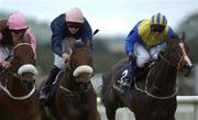 24 August 2002; From left Zady, with Johnny Murtagh up, Iron Lad, with Pat Smullen up, and Dolmur, with James Heffernan up, during the Tattersalls Breeders Stakes at The Curragh Racecourse in Kildare. Photo by Matt Browne/Sportsfile