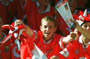 25 August 2002; Young Cork fans cheer on their side during the Bank of Ireland All-Ireland Senior Football Championship Semi-Final match between Kerry and Cork at Croke Park in Dublin. Photo by Brian Lawless/Sportsfile