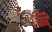 27 August 2002; Armagh manager Joe Kernan, right, and Dublin manager Tommy Lyons hold the Sam Maguire Cup after a Bank of Ireland Football Championship press conference at Bank of Ireland Headquarters on Baggot Street in Dublin. Photo by David Maher/Sportsfile