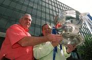 27 August 2002; Armagh manager Joe Kernan, left, and Dublin manager Tommy Lyons hold the Sam Maguire Cup after a Bank of Ireland Football Championship press conference at Bank of Ireland Headquarters on Baggot Street in Dublin. Photo by David Maher/Sportsfile