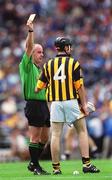 18 August 2002; Referee John Sexton shows the yellow card to David Prendergast of Kilkenny during the All-Ireland Minor Hurling Championship Semi-Final match between Kilkenny and Galway at Croke Park in Dublin. Photo by Ray McManus/Sportsfile