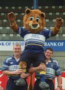 27 August 2002; Leinster players Victor Costello, left, and Reggie Corrigan, with the Leinster Lions mascot as Leinster Rugby announced a year two of their sponsorship deal with Bank of Scotland at Donnybrook Stadim in Dublin. Photo by Damien Eagers/Sportsfile