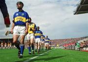 18 August 2002; Tipperary captain Thomas Dunne leads his team-mates in the parade prior to the Guinness All-Ireland Senior Hurling Championship Semi-Final match between Kilkenny and Tipperary at Croke Park in Dublin. Photo by Pat Murphy/Sportsfile