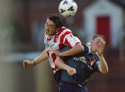 29 August 2002; Philip Hughes of St Patrick's Athletic in action against Peter Hutton of Derry City eircom League Premier Division match between Derry City and St Patrick's Athletic at the Brandywell Stadium in Derry. Photo by David Maher/Sportsfile