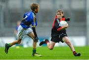20 August 2017; Darragh Kane of St Patrick's Hilltown, Co Down, representing Mayo, in action against Jack McConville of Holy Rosary P.S., Co Down, representing Kerry, during the INTO Cumann na mBunscol GAA Respect Exhibition Go Games at half time during the GAA Football All-Ireland Senior Championship Semi-Final match between Kerry and Mayo at Croke Park in Dublin. Photo by Piaras Ó Mídheach/Sportsfile