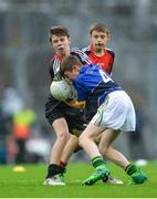 20 August 2017; Owen O'Neill of St Finbarr's Boys' National School, Co Cork, representing Kerry, in action against Jack Bookle of Scoil Naomh Mhuire, Co Wicklow, representing Mayo, during the INTO Cumann na mBunscol GAA Respect Exhibition Go Games at half time during the GAA Football All-Ireland Senior Championship Semi-Final match between Kerry and Mayo at Croke Park in Dublin. Photo by Piaras Ó Mídheach/Sportsfile