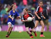 20 August 2017; Jessie McManus of Carrigallen National School, Co Leitrim, representing Mayo, and Carlie O'Donohoe of Moyglass National School, Co Tipperary, representing Kerry, during the INTO Cumann na mBunscol GAA Respect Exhibition Go Games at half time of the GAA Football All-Ireland Senior Championship Semi-Final match between Kerry and Mayo at Croke Park in Dublin. Photo by Stephen McCarthy/Sportsfile